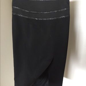 Pencil skirt just below knee, high waist & slit